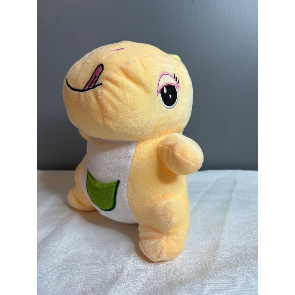 Yellow Dinosaur Plush Stuffed Animal with Green Pocket and Spikes 7 Inch
